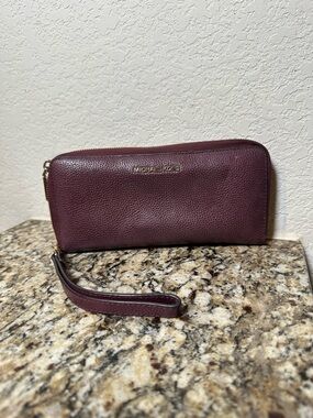 Michael Kors Mauve Leather Zip-Around Wallet with Gold Hardware